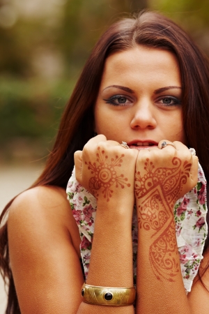 Girl with hands painted Mehandi  Picture by a hennaの写真素材