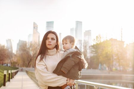 Young girl and child in a parkの写真素材