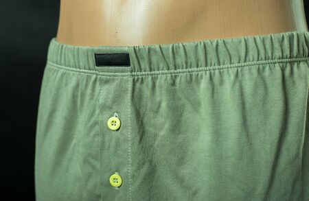 Men's underpants on a mannequin. On an isolated background.の写真素材