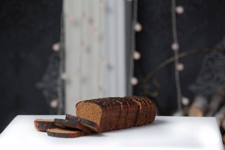 Fresh brown bread slice isolated on white background