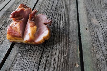 Raw juicy meat steak on dark wooden backgroundの写真素材