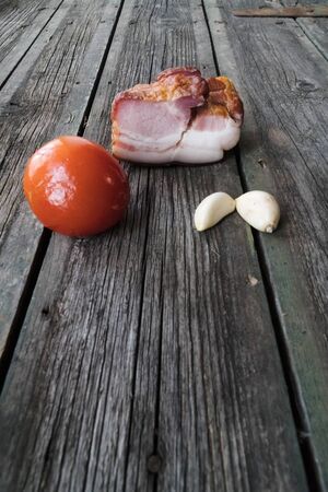 Fresh steak loin of raw meat and spices and a knife lies on a wooden background. copy space.の写真素材
