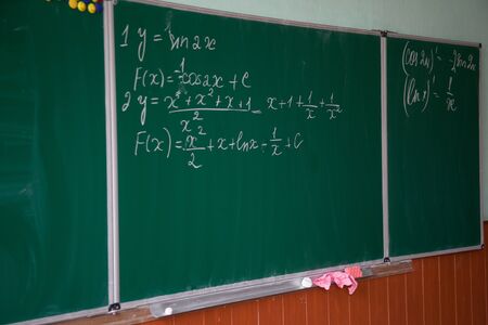 close up of math formulas on a blackboardの写真素材