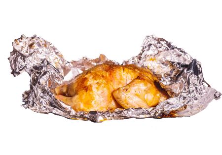 Delicious grilled chicken laid on foil. Isolate on white background.の写真素材