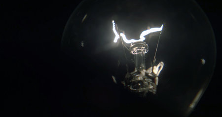 light bulb on a black background, idea concept, close-up