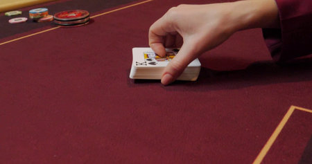 playing cards and chips on a table in a casino, close-up