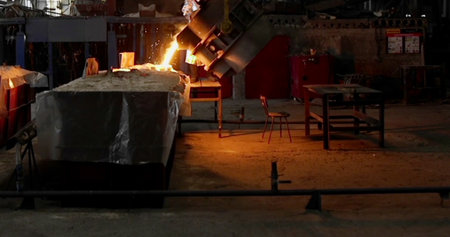 hot iron in the steel mills. production of iron products in the steel mills