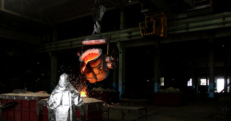 Welding in a metallurgical plant. Welding with sparks.