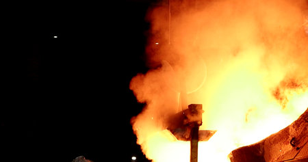 Flaming of iron with sparks at a metallurgical plant