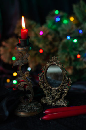 Candles burn out on vintage candle holdersの写真素材