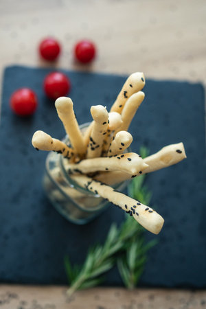 Grissini sprinkled with black sesame seedsの写真素材