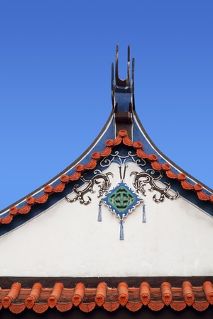 Traditional Chinese temple building against blue sky の写真素材