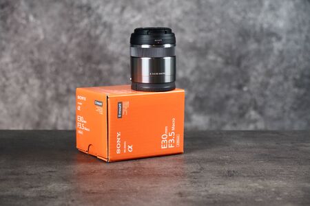 Tallinn, Estonia 11 09 2019: new sony macro lens 30mm f3.5. photo of lens with boxのeditorial素材