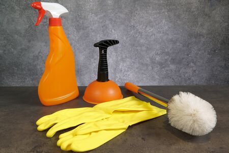 Set of cleaning supplies on grey backgroundの写真素材