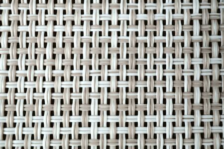 plastic knitted texture, beige color close up