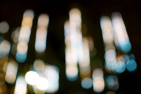 Abstract, blurred bokeh background urban abstract texture dark background for any designの写真素材