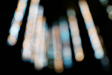 Abstract, blurred bokeh background urban abstract texture dark background for any design