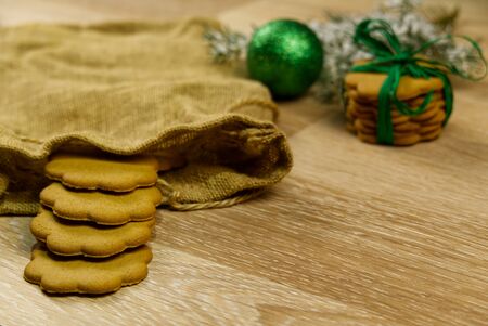 Christmas cookie or Gingerbread cookies on a wooden background.