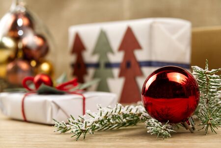 Vintage Christmas composition. Christmas ornaments, red,gold and green decorations on white background. Copy space. close up photo. can be used us postcard or Christmas bannerの写真素材