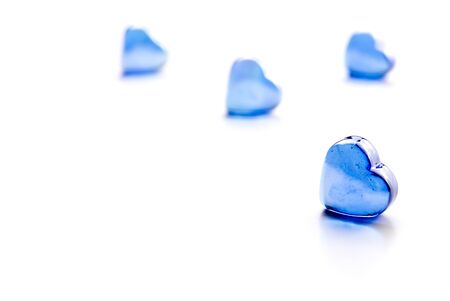 Glass heart blue on the white perfect for San Valentin, lovers, weddings and just great feelingの写真素材