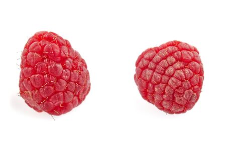 Collection of ripe red raspberries on white background. close-up photoの写真素材