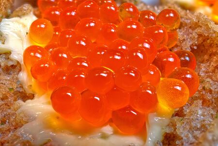macro photography of sandwich with red caviar. Red Caviar cloase up.の写真素材