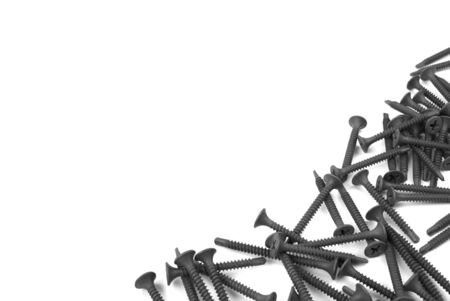 drywall Screw isolated on white background. black screw for metal.の写真素材