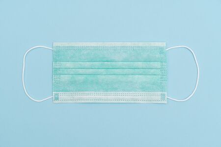 Antivirus face mask. Medicine face mask. Surgical mask with rubber ear straps.Prevention of virus,...