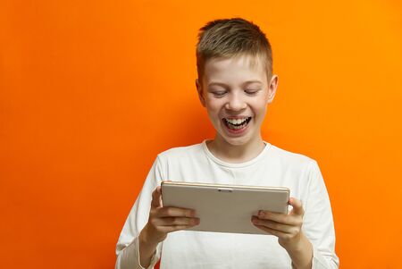 Social distancing and Online communication concept, Happy boy Chatting with friend by tablet on...