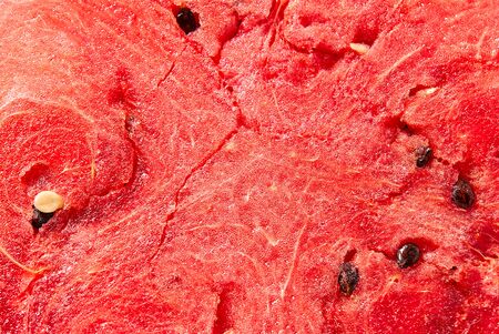 Juicy, ripe, sweet watermelon.. Abstract red fresh watermelon detailed background texture.