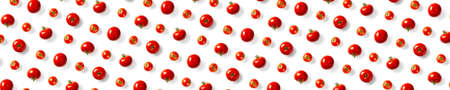 creative background from red tomatoes. Abstract background. of isolated ripe Tomato on the white...