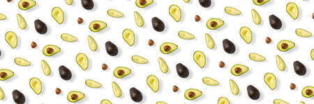 Avocado banner. Background made from isolated Avocado pieces on white background. Flat lay of fresh ripe avocados and avacado piecesの写真素材