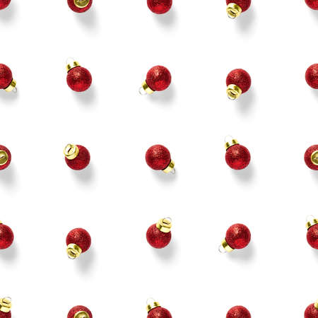 Seamless pattern with red Christmas decorations on white background. Christmas red ornaments Seamless pattern. Christmas abstract background made from balls.の写真素材