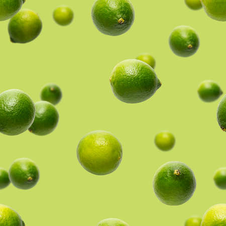 Seamless pattern with falling green lime. Tropical abstract Seamless pattern background. Lime on the...