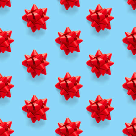 Seamless regular creative Christmas pattern with New Year decorations on blue background. xmas...