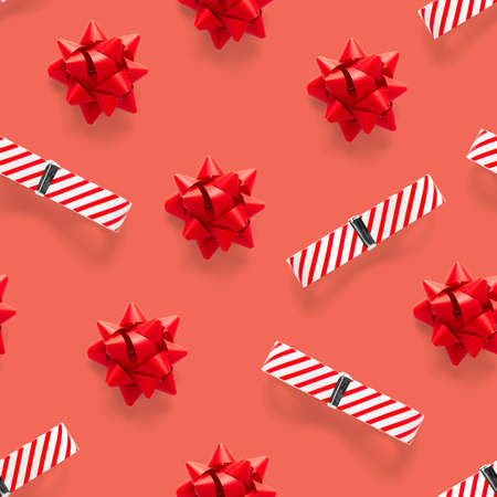 Seamless regular creative Christmas pattern with New Year decorations on red background. xmas Modern Seamless pattern made from christmas decorations. Photo quality pattern for fabric, prints, wallpapers, banners or creative design works.の写真素材