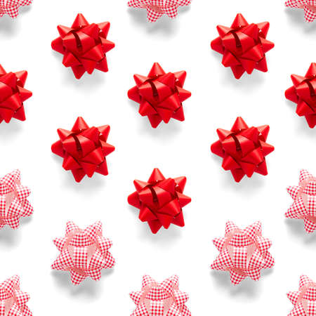 Seamless regular creative Christmas pattern with New Year decorations on white background. xmas Modern Seamless pattern made from christmas decorations. Photo quality pattern for fabric, prints, wallpapers, banners or creative design works.の写真素材