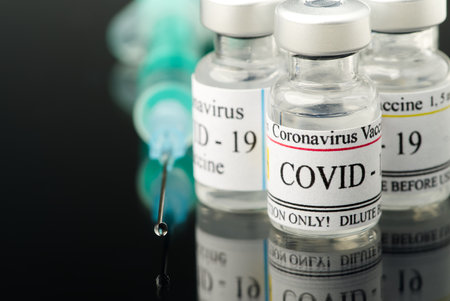 vaccine concept in small glass ampoulesの写真素材