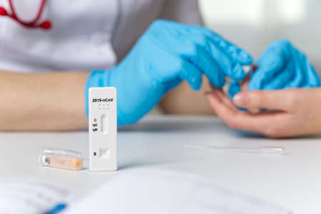 rapid test. testing patient using rapid test device for COVID-19.