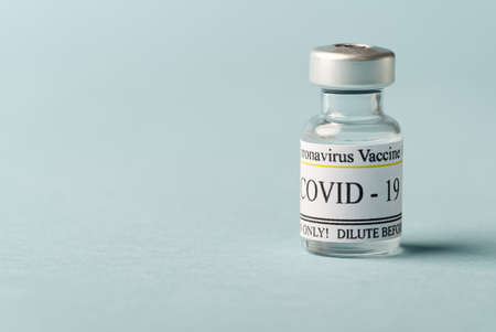Covid-19 vaccine concept. vaccine in small glass ampoules
