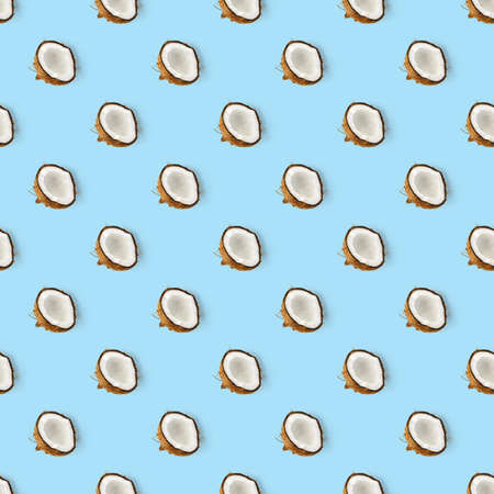 coconut Seamless pattern. Tropical abstract background with isolated Coconut on blue background. flat lay.の写真素材