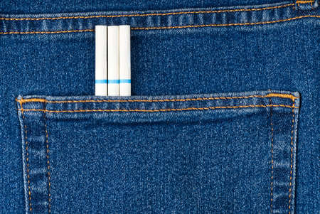 slim cigarettes in the jeans pocket on back sideの写真素材