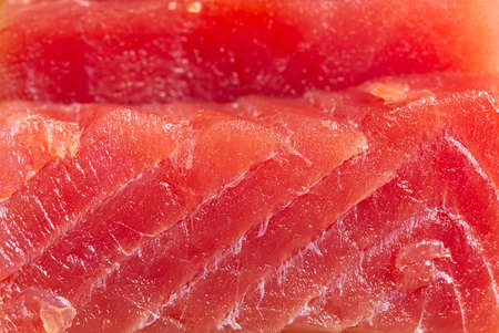 sliced bluefin tuna raw meat texture, close-upの写真素材