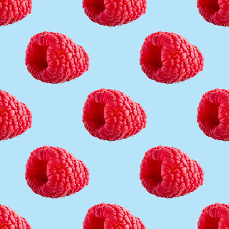Seamless pattern with ripe raspberry. Berries abstract background. Raspberry pattern for package design with blue background.の写真素材