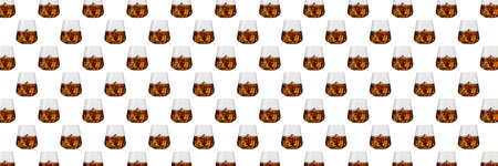 Seamless pattern - glasses of whisky on white background. abstract alcoholic drinks pattern for packaging design.の写真素材