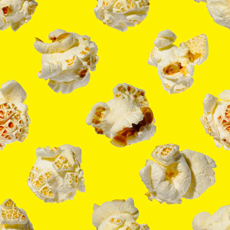 seamless pattern - popcorn. popcorn on a yellow background, pattern for designer. packing design backgroundの写真素材
