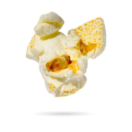 Macro popcorn isolated on white background. single popcornの写真素材