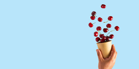 Flying cherries vertical isolated as package design elements. Flying cherry. Fresh raw cheery...
