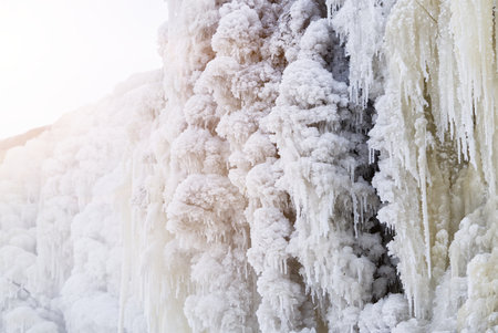 Frozen small mountain waterfall close up. Frozen Jagala Falls, Estoniaの写真素材