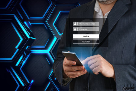 login landing page concept. User typing login and password. Hand man use mobile phone for log inの写真素材